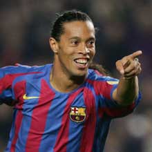 Ronaldinho is looking forward to facing his friend Thierry Henry in Paris